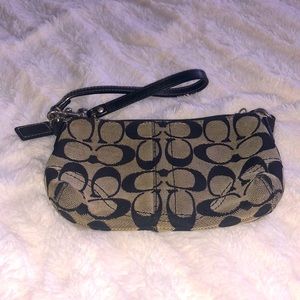 COACH Clutch w/ Classic monogram pattern